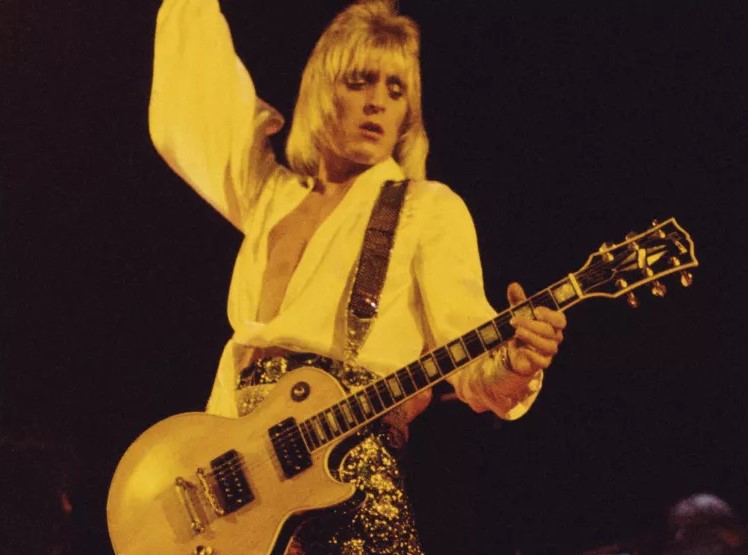 Mick Ronson playing his iconic Gibson Les Paul. 